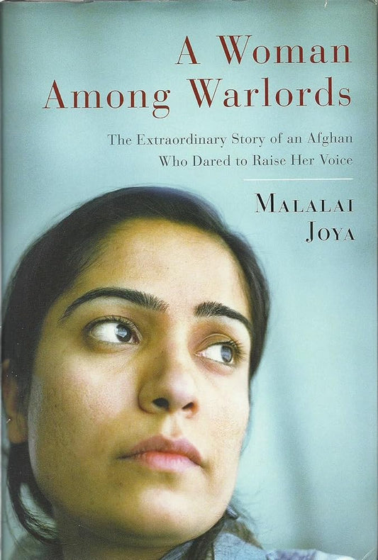 A Woman Among Warlords: The Extraordinary Story of an Afghan Who Dared to Raise Her Voice - The Bookstore