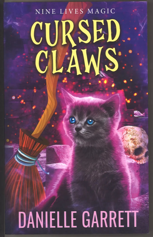 Cursed Claws (A Nine Lives Magic Mystery, Book 3) - The Bookstore