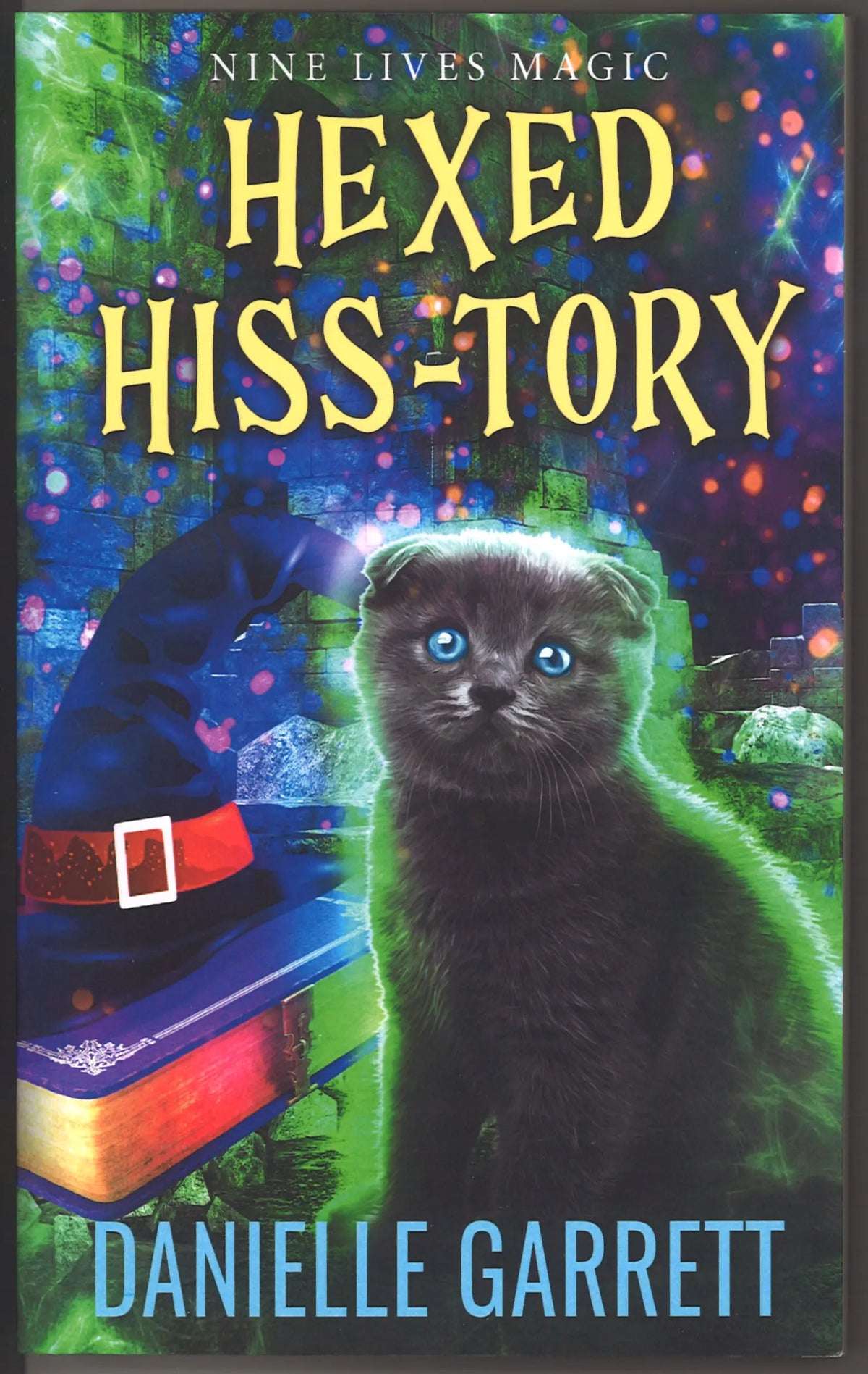 Hexed Hiss-Tory (A Nine Lives Magic Mystery, Book 2)