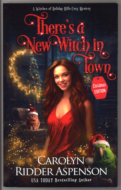There's a New Witch in Town  (The Witches of Holiday Hills Cozy Mystery Series) - Christmas Edition